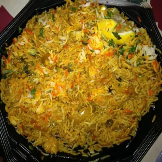 Lucknowi Chicken Biryani.